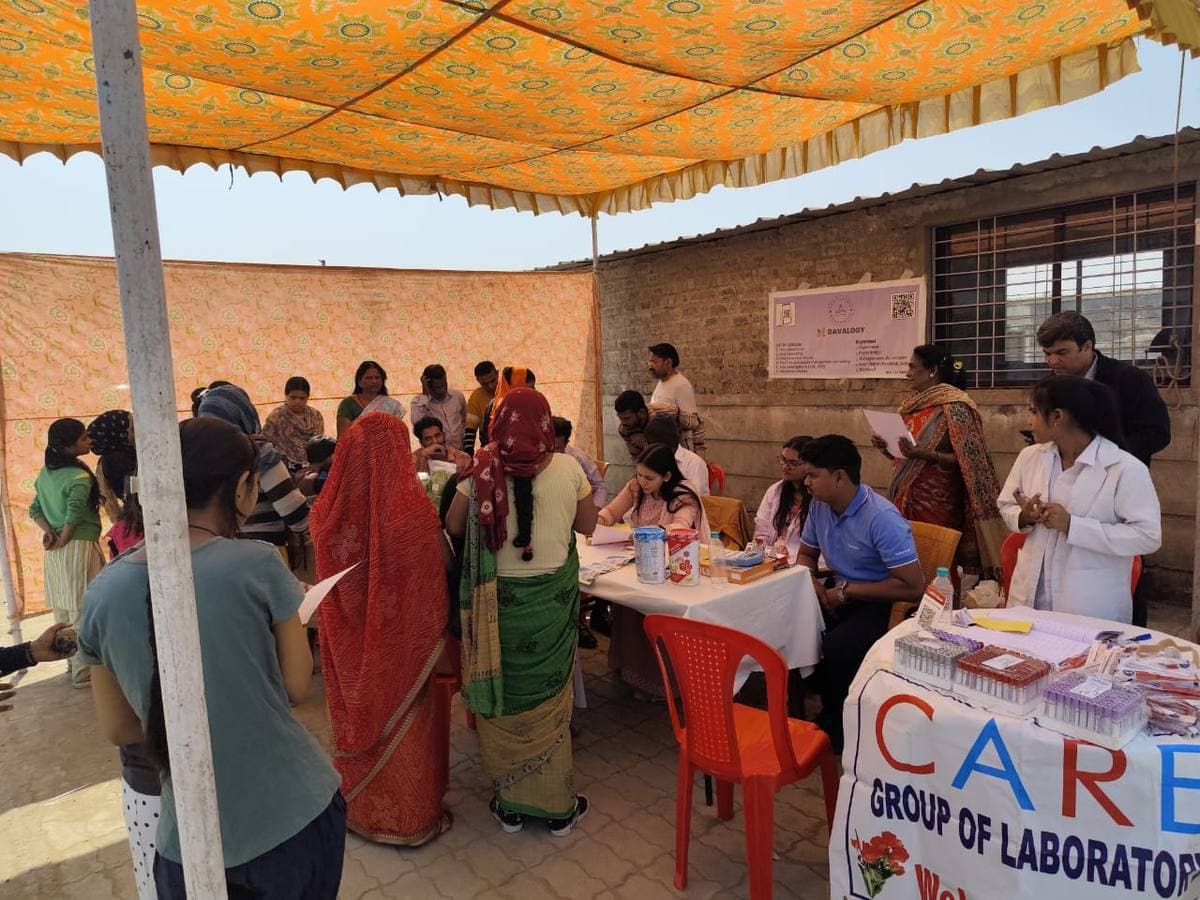 Davalogy team interacting with attendees